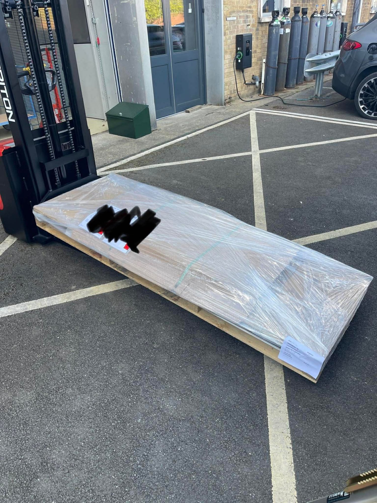 Large wrapped item on pallet