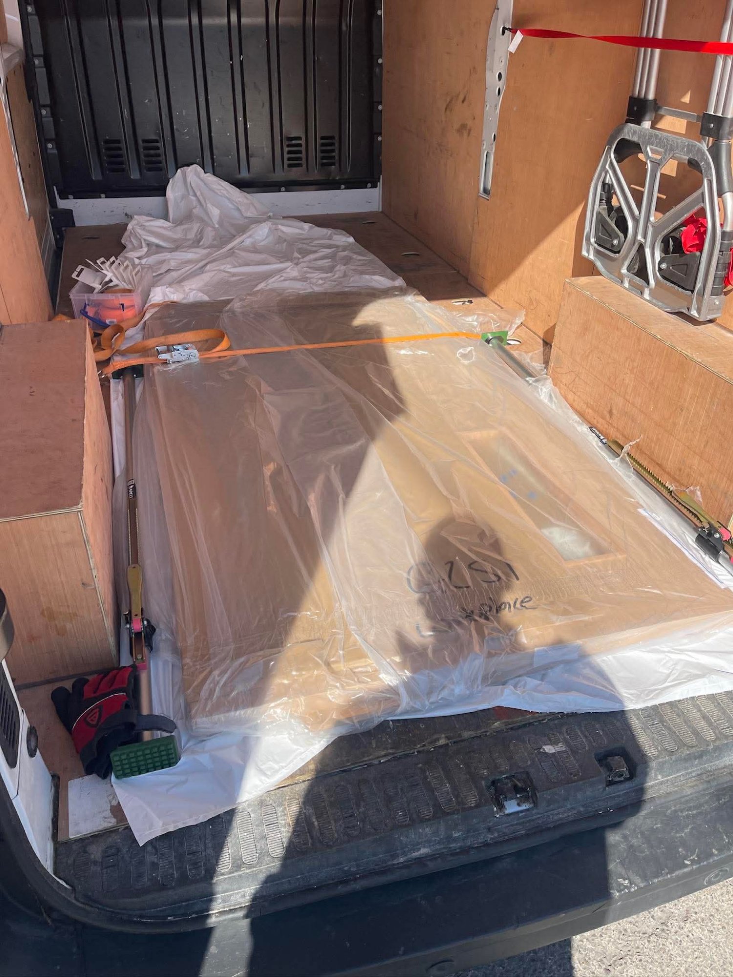 Furniture strapped in transit van